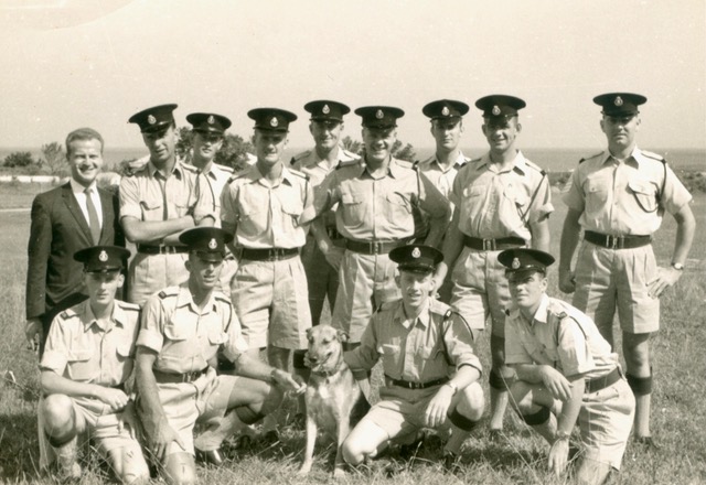 Khaki uniforms and flat caps